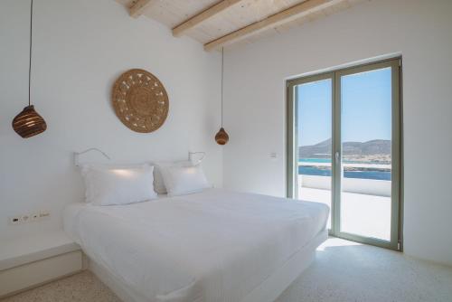 Postel nebo postele na pokoji v ubytování Levanda House Antiparos - Private Pool Villa