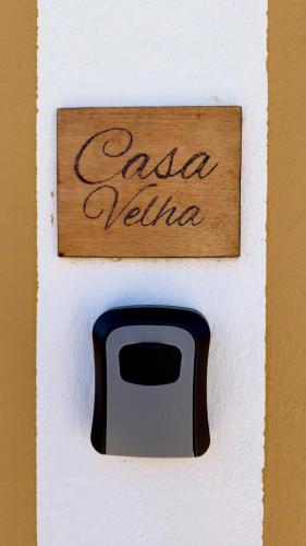 a sign that says carana talma on a wall at Vela de Estai in Vila Nova de Milfontes