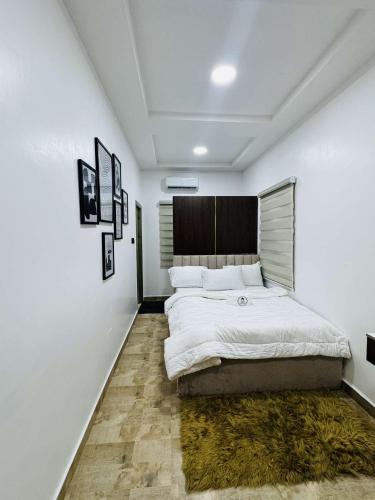 เตียงในห้องที่ Tastic Homes