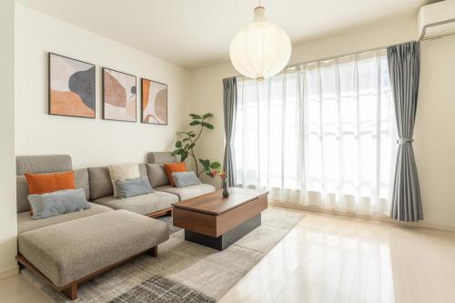 Posezení v ubytování 年末年始特別割引 無料 駐車 4ldk戸建 関空 難波 心斎橋 通天閣 スパワールド世界の大温泉 天王寺動物園 京都直通 天下茶屋駅徒歩5分