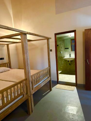 Una cama o camas en una habitación de Ruvee Villa