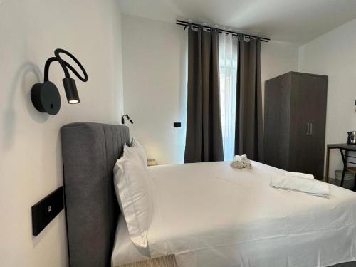 Postel nebo postele na pokoji v ubytování Umberto 28 Guest House
