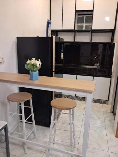 MMs Apartelleにあるキッチンまたは簡易キッチン