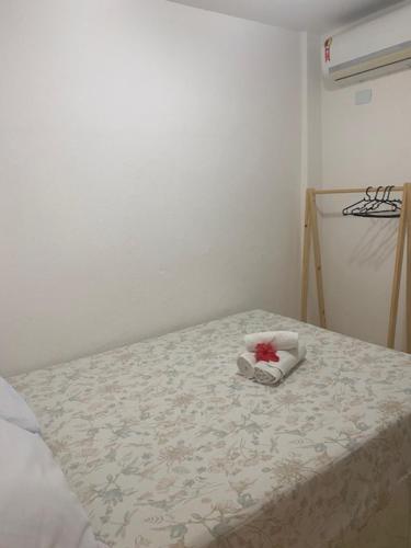 Ένα ή περισσότερα κρεβάτια σε δωμάτιο στο Flats Parada Obrigatoria