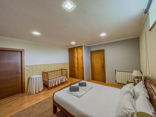 Postel nebo postele na pokoji v ubytování Casa Antigo Alambique