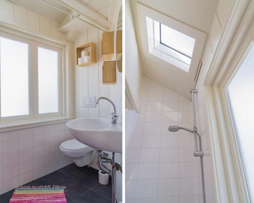 a bathroom with a sink and a toilet and a window at Pat's home in Alkmaar