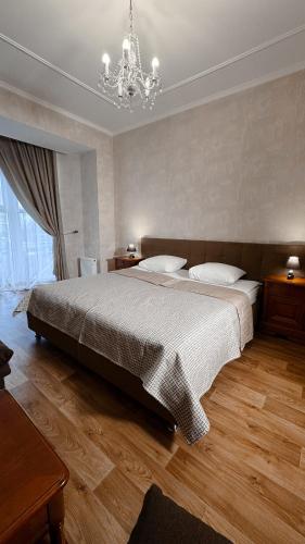 Postel nebo postele na pokoji v ubytování Hotel Palace Ukraine