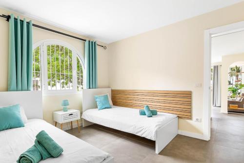 Postel nebo postele na pokoji v ubytování Bungalow Julia Tenerife