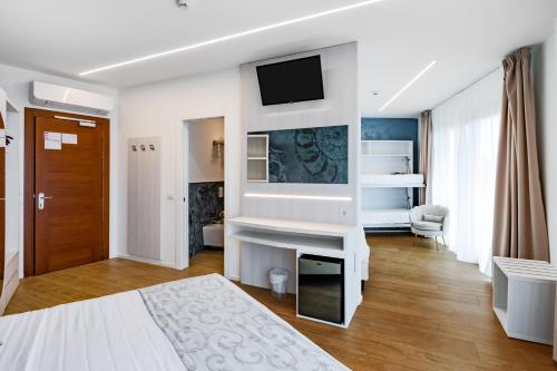 Postel nebo postele na pokoji v ubytování Hotel Franz