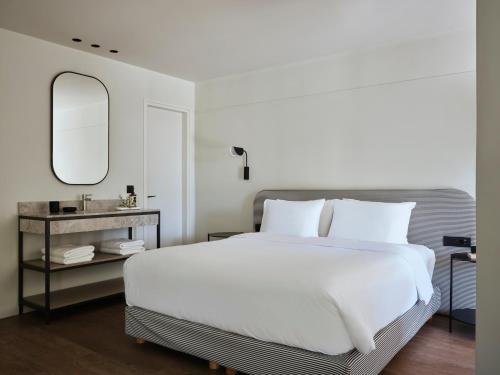Katil atau katil-katil dalam bilik di Doryssa Lithos Hotel