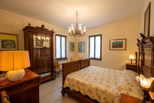 Una cama o camas en una habitación de Borgo Santuletta