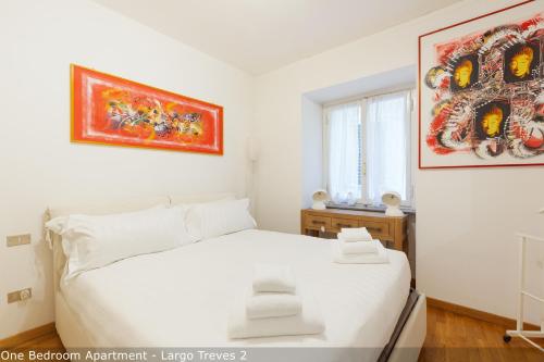 Posteľ alebo postele v izbe v ubytovaní Brera Apartments in San Marco
