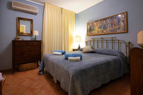 Ένα ή περισσότερα κρεβάτια σε δωμάτιο στο Duomo Square Apartment