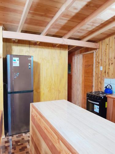 Кухня или мини-кухня в Cabaña entre Villarrica y Lican-Ray
