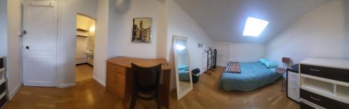 a room with a bedroom with a bed and a sink at Jolie chambre Privée Centre-Ville in Nice