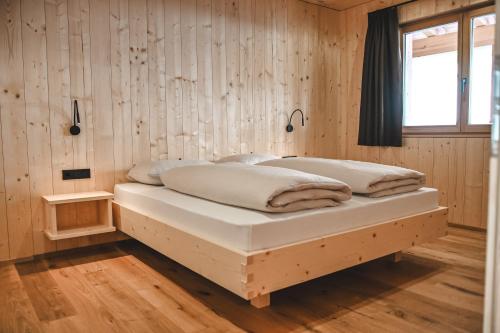 Postel nebo postele na pokoji v ubytování Marerhof