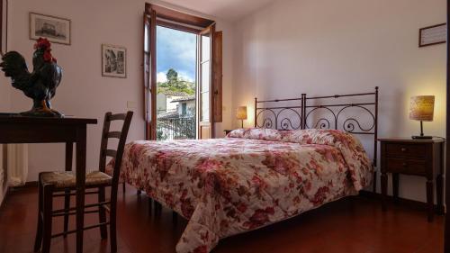 Posteľ alebo postele v izbe v ubytovaní Albergo Giovanni Da Verrazzano