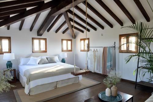 Кровать или кровати в номере Cal Reiet Holistic Retreat