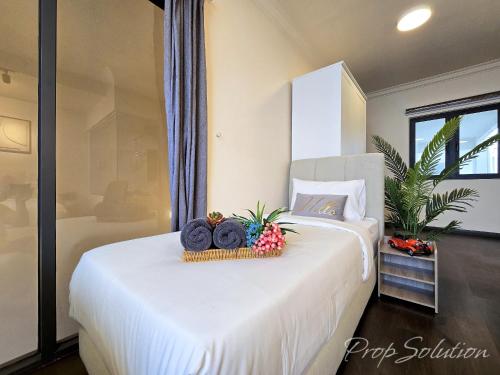 Ένα ή περισσότερα κρεβάτια σε δωμάτιο στο Loft Suite Seaview 2BR JB CIQ 7Pax