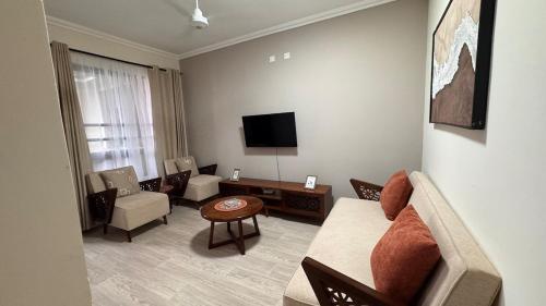 Телевизор и/или развлекательный центр в 2br master en-suite in Vipingo, Kilifi