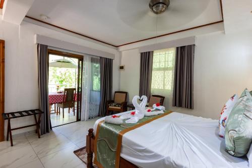 Ένα ή περισσότερα κρεβάτια σε δωμάτιο στο Sea View Lodge