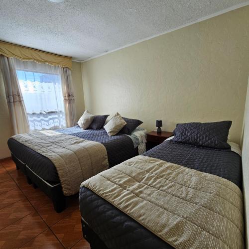 Hotel Cristobal Colonにあるベッド
