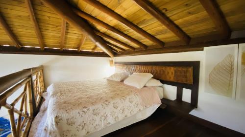 Ένα ή περισσότερα κρεβάτια σε δωμάτιο στο Aloha Residence I