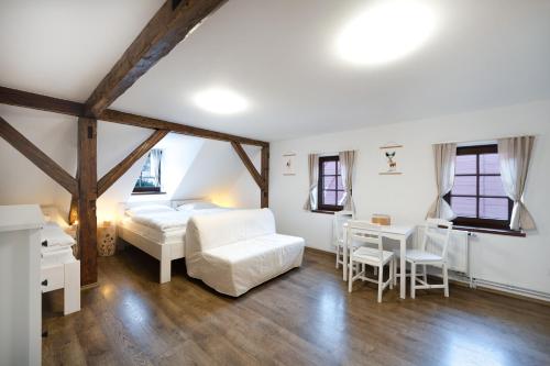 Postel nebo postele na pokoji v ubytování Avama - apartmány Srní
