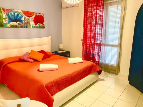 Ένα ή περισσότερα κρεβάτια σε δωμάτιο στο Apartments Di Salvo
