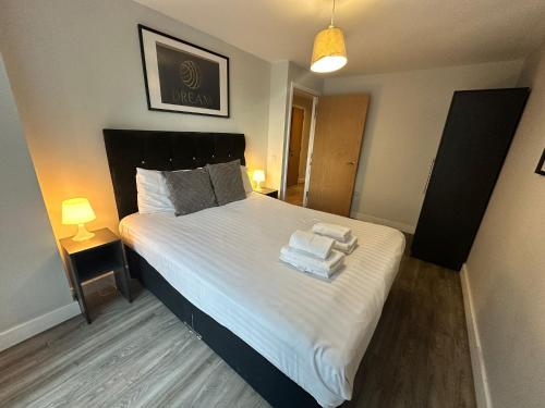 Katil atau katil-katil dalam bilik di Obel Apartments by Beehosting