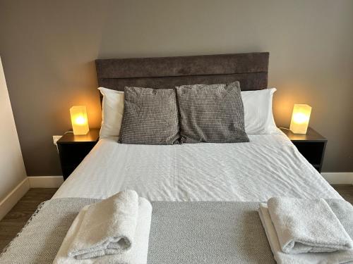 Katil atau katil-katil dalam bilik di Obel Apartments by Beehosting