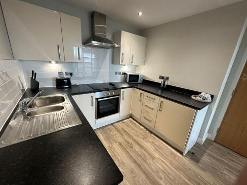 Dapur atau dapur kecil di Obel Apartments by Beehosting