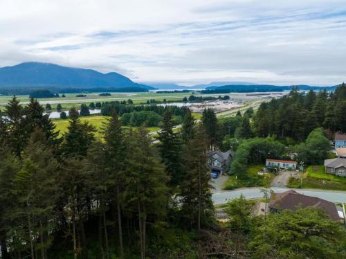 a view of a town with trees and a road at Affordable Luxury With Views A305 in Juneau