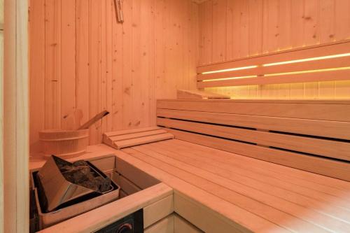 an empty sauna with a toilet in the middle at Spacious house with sea view in Liencres + jacuzzi in Liencres