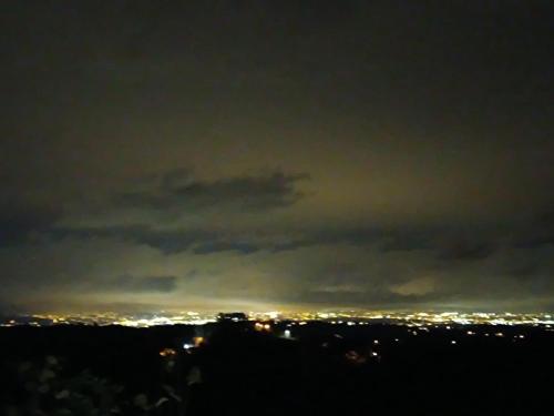 a view of a city at night at Sweet Sky apartman in Samobor