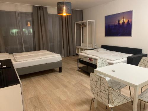 Кровать или кровати в номере Residence Port Karolina