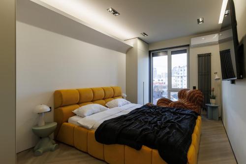 The Red Mill - Elegance Loft में एक कमरे में एक या कई बेड