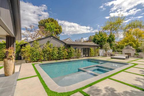 a swimming pool in the backyard of a house at Modern luxury house pool enormous yard in Los Angeles