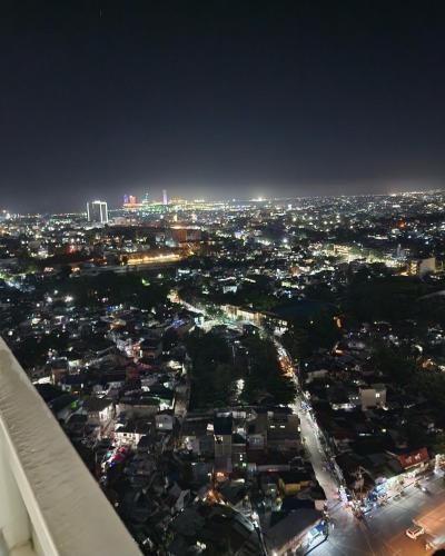 a view of a city at night from an airplane at Twilight23 Condo in Cebu City