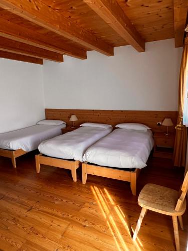 Cama o camas de una habitación en Agriturismo Busa dei Sbrase