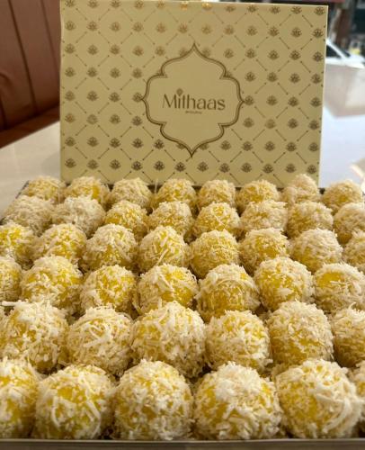 a box of muffins sitting on top of a table at Hotel Gajraj in Gangtok