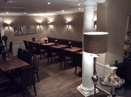 Χώρος καθιστικού στο Landcafe mit Mini Hotel