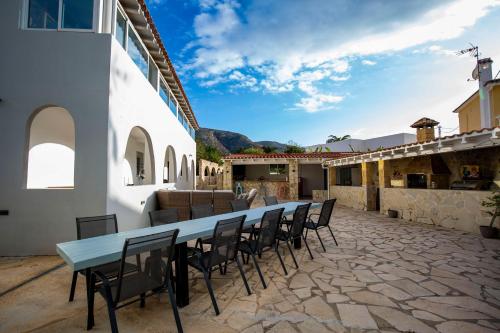 a table and chairs on the patio of a house at Luxury Private Complex in Albir