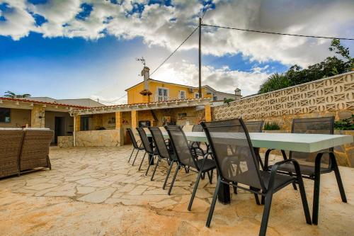 a table and chairs in front of a house at Luxury Private Complex in Albir