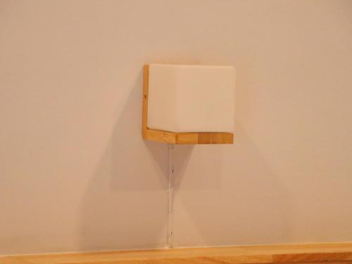 a light on a wall with water dripping from it at Moya Boutique Hotel in Betong