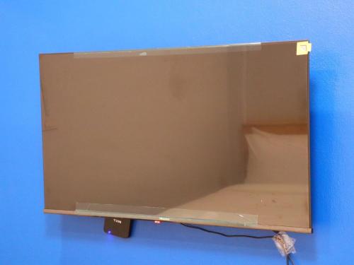 a box is hanging on a blue wall at Moya Boutique Hotel in Betong