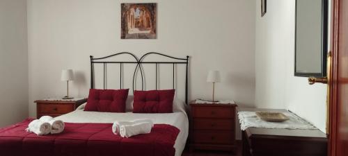Postel nebo postele na pokoji v ubytování Casa El Nisperero