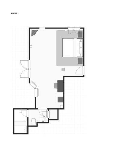 a drawing of a floor plan of a house at Deluxe King Suite at the Historic Stonehouse Inn! in Santa Rosa
