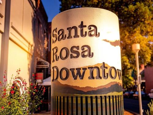 a sign that says santa rosa downscription on a building at Deluxe King Suite at the Historic Stonehouse Inn! in Santa Rosa