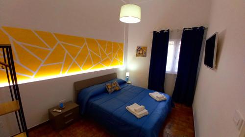 Postel nebo postele na pokoji v ubytování Sole d'Occidente